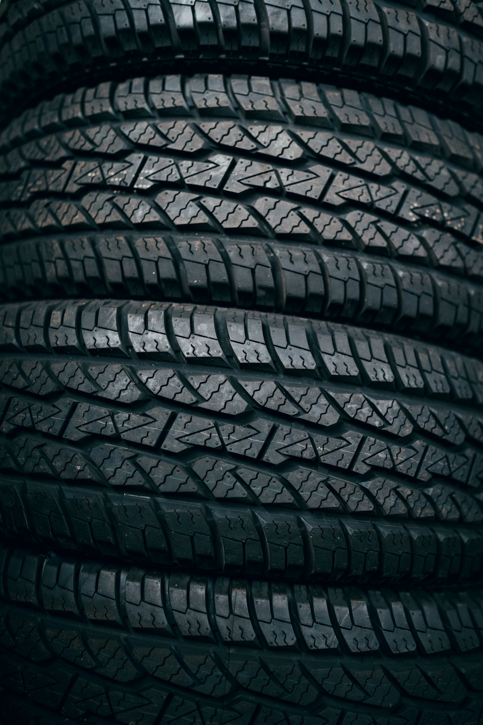 Stack of new tires showing tread detail